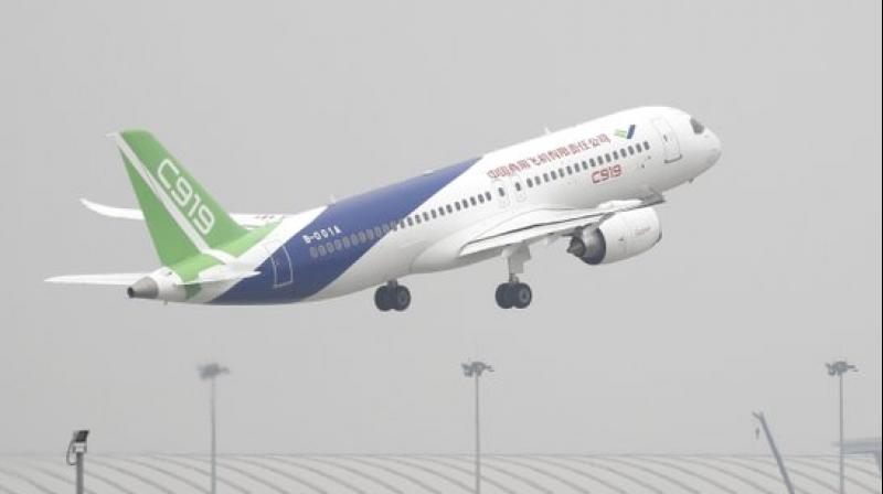 China’s first large homemade passenger jetliner is due to make its maiden flight from Shanghai later Friday, (Photo: AP) China’s first large homemade passenger jetliner is due to make its maiden flight from Shanghai later Friday, (Photo: AP)