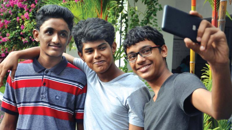 Students of Seventh Day Adventist Higher Secondary School take a selfie to celebrate their victory after the ICSE/ISC results were declared in Kochi on Monday. (Photo: SUNOJ NINAN MATHEW) Students of Seventh Day Adventist Higher Secondary School take a selfie to celebrate their victory after the ICSE/ISC results were declared in Kochi on Monday. (Photo: SUNOJ NINAN MATHEW)