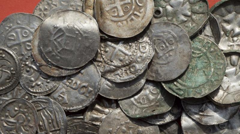 The photo shows medieval Saxonian, Ottoman, Danish and Byzantine coins after a medieval silver treasure had been found near Schaprode on the northern German island of Ruegen in the Baltic Sea. (Photo: AP) The photo shows medieval Saxonian, Ottoman, Danish and Byzantine coins after a medieval silver treasure had been found near Schaprode on the northern German island of Ruegen in the Baltic Sea. (Photo: AP)