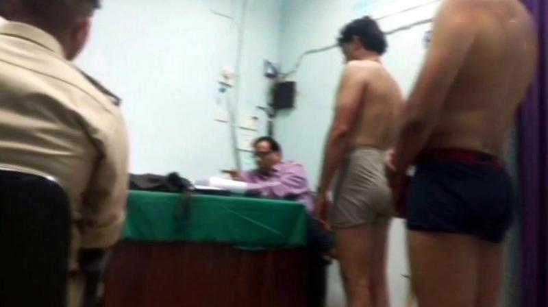 The footage showed young male applicants stripped to their undergarments, lined up to get their height and chest measured in the same room where woman candidates were also being checked. (Photo: ANI | Twitter) The footage showed young male applicants stripped to their undergarments, lined up to get their height and chest measured in the same room where woman candidates were also being checked. (Photo: ANI | Twitter)