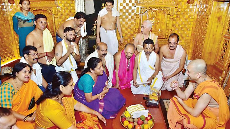 Udupi-Chikkamagalur candidate Shobha Karandlaje visits Sri Krishna Matha in Udupi along with Defence Minister Nirmala Sitharaman and others recently. Udupi-Chikkamagalur candidate Shobha Karandlaje visits Sri Krishna Matha in Udupi along with Defence Minister Nirmala Sitharaman and others recently.