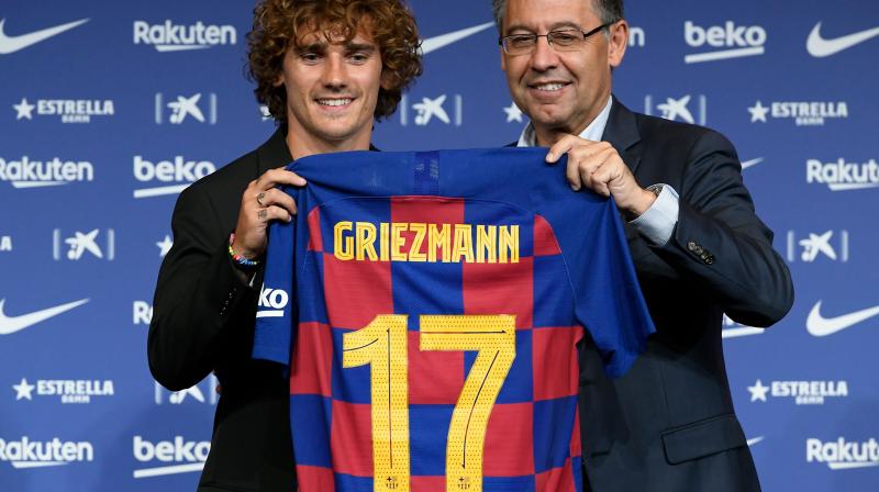 The World Cup winner, ANtoine Griezmann is in Tokyo with Barca ahead of a clash with Chelsea on Tuesday after the La Liga giants shelled out 120 million euros (USD 135 million) to match his release clause amid a blistering row between the player and the two clubs. (Photo:AFP) The World Cup winner, ANtoine Griezmann is in Tokyo with Barca ahead of a clash with Chelsea on Tuesday after the La Liga giants shelled out 120 million euros (USD 135 million) to match his release clause amid a blistering row between the player and the two clubs. (Photo:AFP)