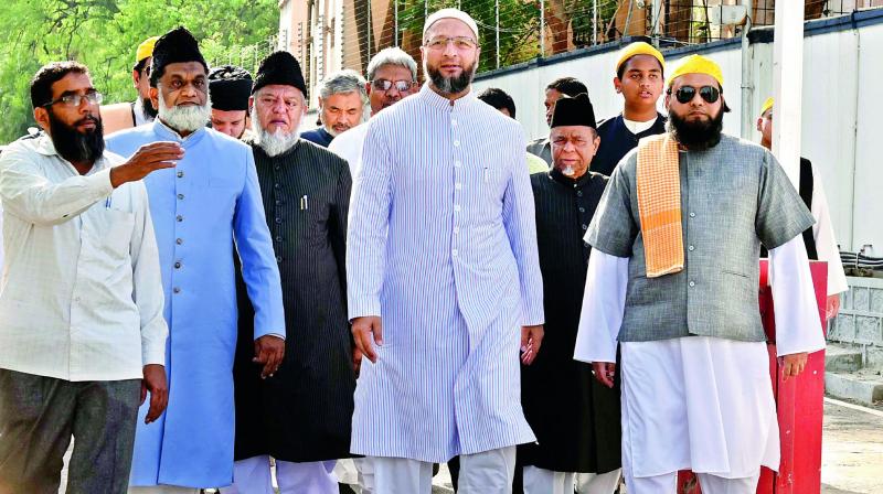 A delegation comprising 10 different Muslim organisations led by AIMIM president and Hyderabad MP Asaduddin Owaisi comes out of Raj Bhavan after submitting a memorandum to AP and TS Governor E.S.L. Narasimhan on Thursday. (Photo:DC) A delegation comprising 10 different Muslim organisations led by AIMIM president and Hyderabad MP Asaduddin Owaisi comes out of Raj Bhavan after submitting a memorandum to AP and TS Governor E.S.L. Narasimhan on Thursday. (Photo:DC)