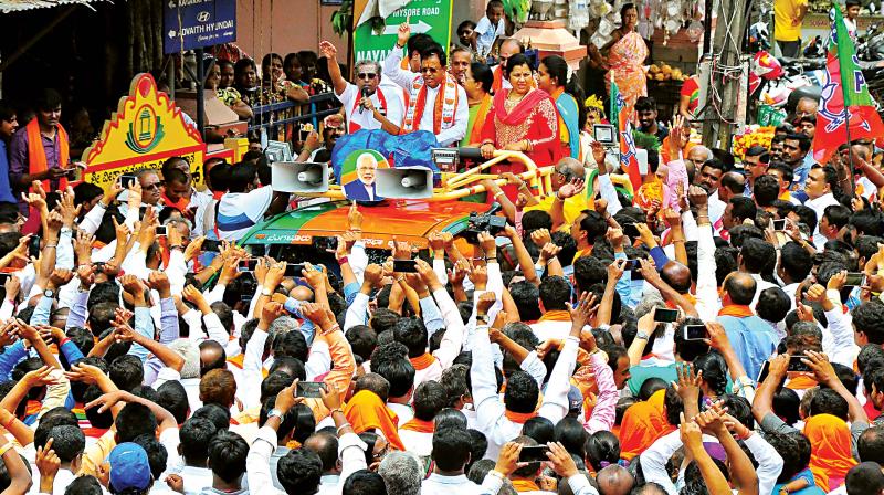 BJP’s Bengaluru South candidate M. Krishnappa in a roadshow before filing papers on Thursday. (Photo:DC) BJP’s Bengaluru South candidate M. Krishnappa in a roadshow before filing papers on Thursday. (Photo:DC)