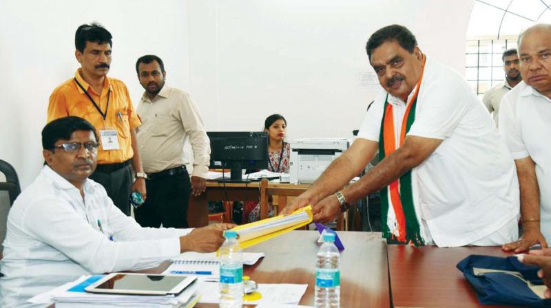 Congress candidate Ramanath Rai files his nomination papers at Bantwal on Thursday. (Photo:KPN) Congress candidate Ramanath Rai files his nomination papers at Bantwal on Thursday. (Photo:KPN)