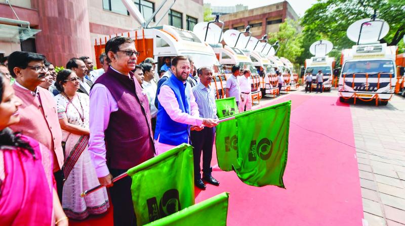 I&B Minister Prakash Javadekar flags off the new DSNG vans assigned to DD News at Doordarshan Bhavan in New Delhi on Tuesday. (Photo: AP) I&B Minister Prakash Javadekar flags off the new DSNG vans assigned to DD News at Doordarshan Bhavan in New Delhi on Tuesday. (Photo: AP)