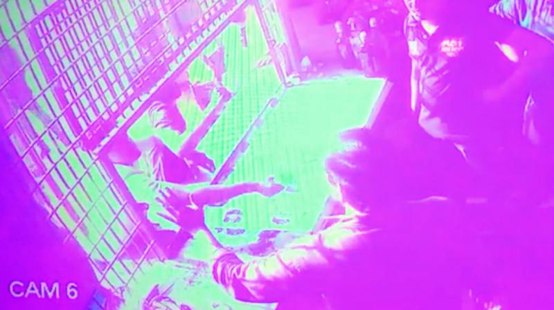 A CCTV grab of the violence at the bar shows the drunk cop and his friend threatening the staffers. A CCTV grab of the violence at the bar shows the drunk cop and his friend threatening the staffers.