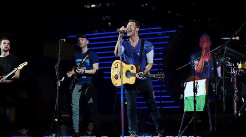 Chris Martin of British Band Coldplay performs during the Global Citizen concert. (Photo: PTI) Chris Martin of British Band Coldplay performs during the Global Citizen concert. (Photo: PTI)