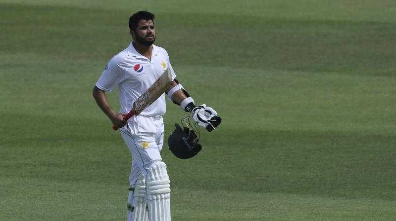 Azhar revealed he was discussing the swing of the ball with Shafiq as they chatted in the middle of the wicket. (Photo: AP) Azhar revealed he was discussing the swing of the ball with Shafiq as they chatted in the middle of the wicket. (Photo: AP)