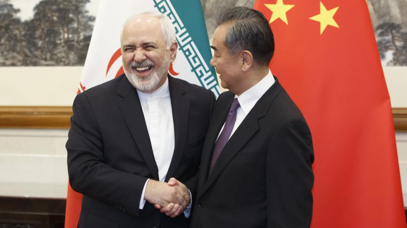 Wang told Zarif during the meeting that China hopes the Iran nuclear deal can be 'fully implemented.' (Photo:AP) Wang told Zarif during the meeting that China hopes the Iran nuclear deal can be 'fully implemented.' (Photo:AP)