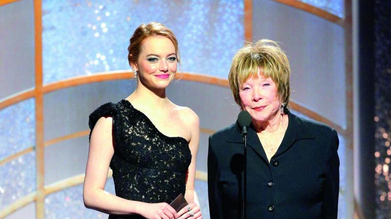 Emma had emerald green and white on her eyelids and violet on her lips. (Photo: DC) Emma had emerald green and white on her eyelids and violet on her lips. (Photo: DC)