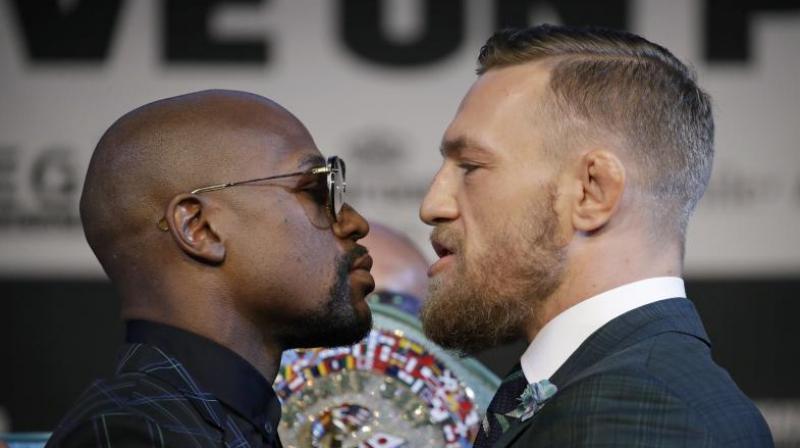 McGregor faces his first ever professional boxing contest against Mayweather, the undefeated former welterweight king who has come out of a two-year retirement to take on the Irish mixed martial arts star. (Photo: AP) McGregor faces his first ever professional boxing contest against Mayweather, the undefeated former welterweight king who has come out of a two-year retirement to take on the Irish mixed martial arts star. (Photo: AP)
