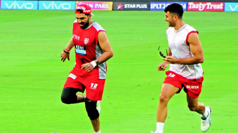 Kings XI Punjab’s Yuvraj Singh (left) and Marcus Stoinis play football during their training session. (Photo: Deepak Deshpande) Kings XI Punjab’s Yuvraj Singh (left) and Marcus Stoinis play football during their training session. (Photo: Deepak Deshpande)