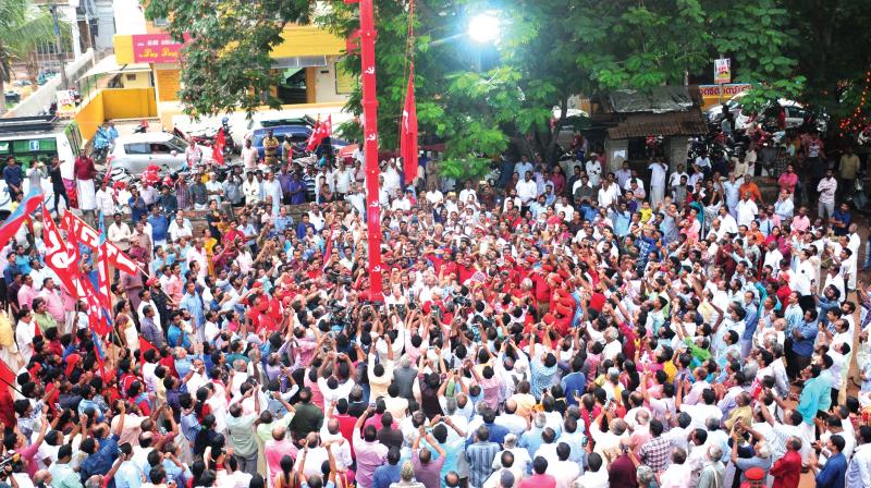 Party workers salute the red flag hoisted by CPI general secretary Sudhakar Reddy marking the beginning of the 23rd CPI congress in Kollam on Wednesday. Party workers salute the red flag hoisted by CPI general secretary Sudhakar Reddy marking the beginning of the 23rd CPI congress in Kollam on Wednesday.