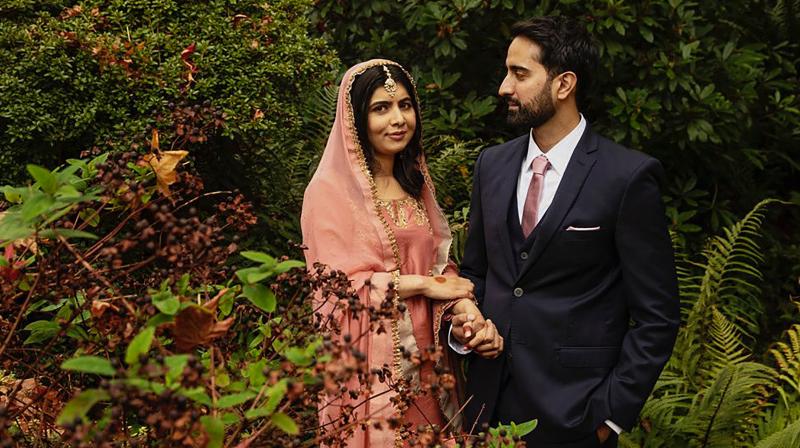 Nobel laureate Malala Yousafzai and her partner Asser on their wedding day in UK's Birmingham. (PTI Photo) Nobel laureate Malala Yousafzai and her partner Asser on their wedding day in UK's Birmingham. (PTI Photo)