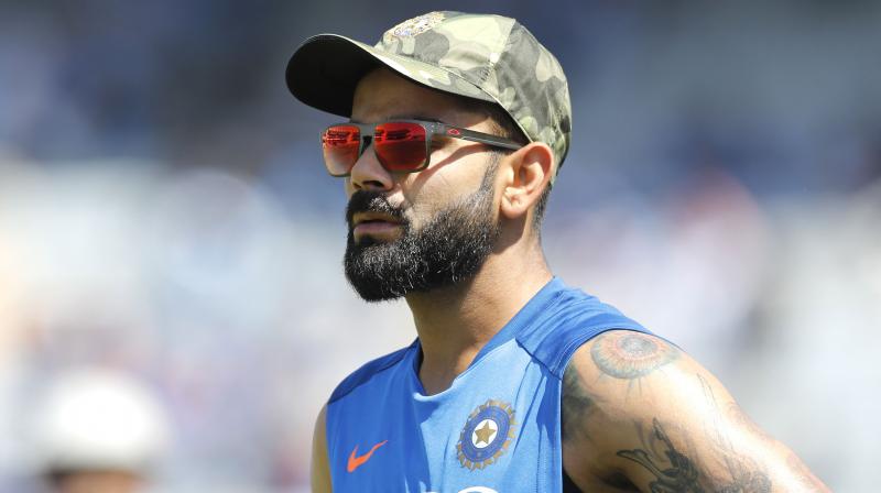 Kohli, who scored only 134 runs during India’s previous tour of England in 2014, amassed 593 runs in his side’s five-test series last year at an average of over 59 to book his place on the list. (Photo: AP) Kohli, who scored only 134 runs during India’s previous tour of England in 2014, amassed 593 runs in his side’s five-test series last year at an average of over 59 to book his place on the list. (Photo: AP)