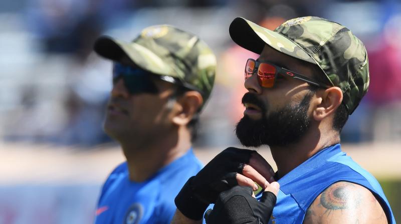 Former captain Bishan Singh Bedi tagged Mahendra Singh Dhoni as India's "half a captain" in the limited-overs and said his absence made Virat Kohli "visibly rough" on the field during the fourth ODI against Australia. (Photo: AFP) Former captain Bishan Singh Bedi tagged Mahendra Singh Dhoni as India's "half a captain" in the limited-overs and said his absence made Virat Kohli "visibly rough" on the field during the fourth ODI against Australia. (Photo: AFP)