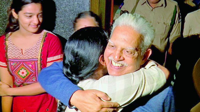 Varavara Rao greeting his family members after he was brought to the city by Pune Police on Thursday. (Photo: DC) Varavara Rao greeting his family members after he was brought to the city by Pune Police on Thursday. (Photo: DC)