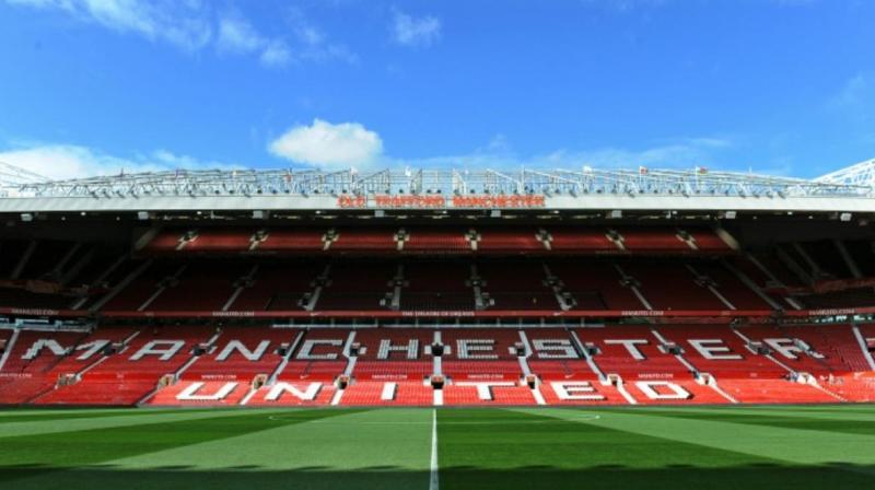 A Manchester United fans group says it welcomes the clubs application to have 1,500 rail seats installed at Old Trafford, intended to allow supporters to stand in safety. (Photo:AFP)