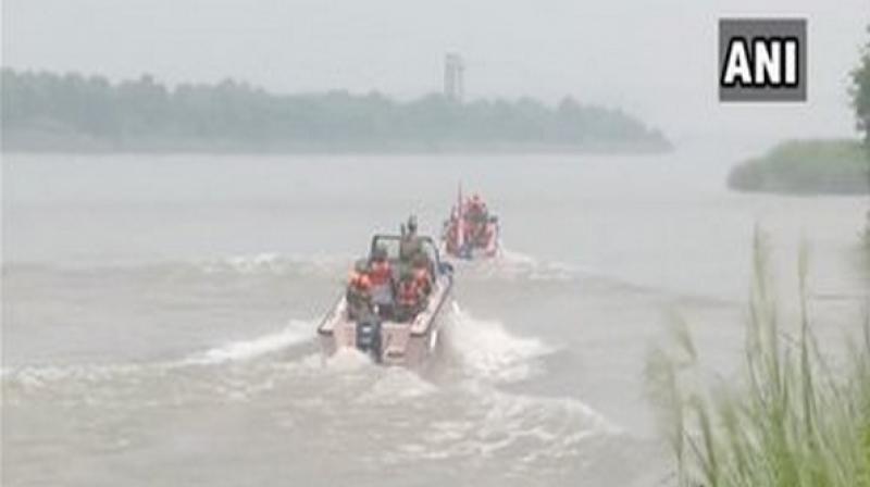 Patrolling parties of the BSF secure the border day and night to prevent infiltration as the water level in the river rises during rainfall, an official said. (Photo: ANI) Patrolling parties of the BSF secure the border day and night to prevent infiltration as the water level in the river rises during rainfall, an official said. (Photo: ANI)