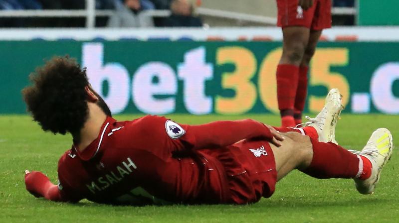 Salah was stretchered off during Liverpool's tense 3-2 win at Newcastle on Saturday that kept alive their chances of a first Premier League title in 29 year. (Photo: AFP) Salah was stretchered off during Liverpool's tense 3-2 win at Newcastle on Saturday that kept alive their chances of a first Premier League title in 29 year. (Photo: AFP)