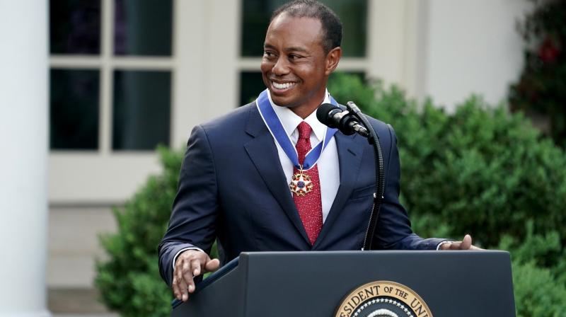 Woods choked up as he thanked his mother, his two children, his girlfriend and his caddy during the ceremony on Monday in the White House Rose Garden. (Photo: Tiger Woods/Twitter) Woods choked up as he thanked his mother, his two children, his girlfriend and his caddy during the ceremony on Monday in the White House Rose Garden. (Photo: Tiger Woods/Twitter)