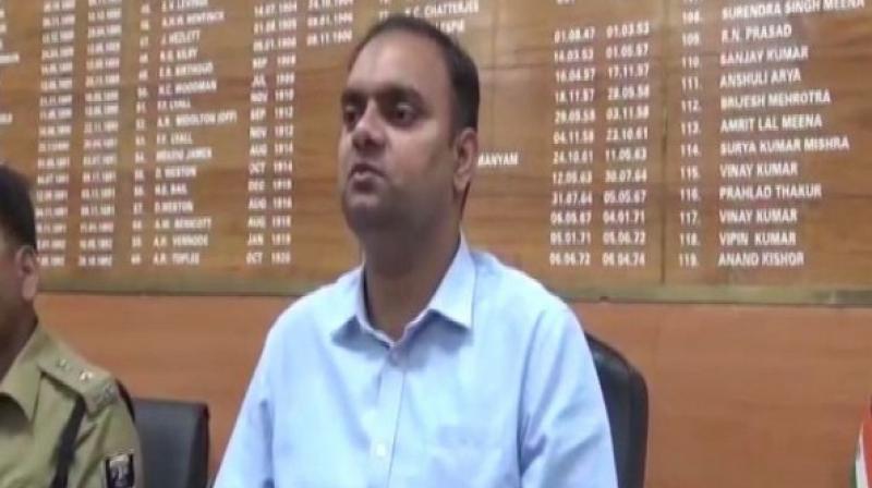 District Collector Alok Ranjan Ghosh said that the Sector Officer Awadesh Singh's driver had expressed his desire to vote. According to a primary reply by the officer, he had taken the EVM machine and VVPAT into a private hotel. (Photo: ANI)) District Collector Alok Ranjan Ghosh said that the Sector Officer Awadesh Singh's driver had expressed his desire to vote. According to a primary reply by the officer, he had taken the EVM machine and VVPAT into a private hotel. (Photo: ANI))