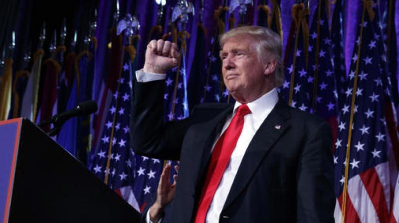 President-elect Donald Trump pumps his fist during an election night rally. (Photo: AP) President-elect Donald Trump pumps his fist during an election night rally. (Photo: AP)