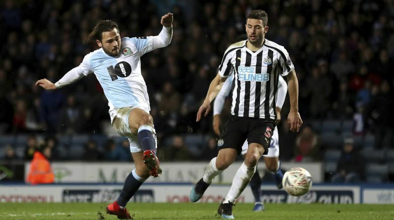 Newcastle fans, who had seen their side narrowly escape defeat in the home match with Championship Blackburn, were given some respite from their top-flight struggles with a replay win against their fellow six-time FA Cup winners at Ewood Park. (Photo: AP) Newcastle fans, who had seen their side narrowly escape defeat in the home match with Championship Blackburn, were given some respite from their top-flight struggles with a replay win against their fellow six-time FA Cup winners at Ewood Park. (Photo: AP)