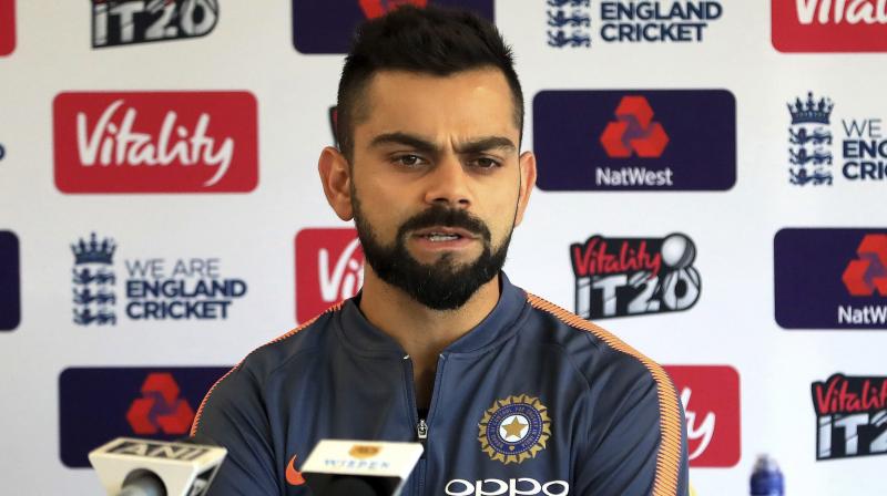 Virat Kohli said his squad was expecting a tough battle against England in their upcoming three-match T20 series, which begins at Old Trafford on Tuesday, as well as in five Tests and three ODIs that will keep them in England until September. (Photo: AP) Virat Kohli said his squad was expecting a tough battle against England in their upcoming three-match T20 series, which begins at Old Trafford on Tuesday, as well as in five Tests and three ODIs that will keep them in England until September. (Photo: AP)