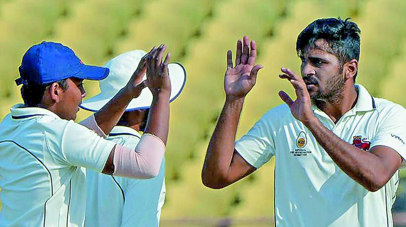 Mumbai pacer Shardul Thakur celebrates a Tamil Nadu wicket. (Left): Tamil Nadu’s M. Kaushik Gandhi in action. He scored 50. Mumbai pacer Shardul Thakur celebrates a Tamil Nadu wicket. (Left): Tamil Nadu’s M. Kaushik Gandhi in action. He scored 50.