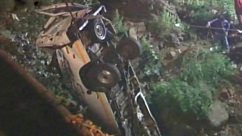 At least 13 people were killed after a mini-bus carrying 17 passengers fell into Panchganga river at Kolhapur in Western Maharashtra. (Photo: ANI) At least 13 people were killed after a mini-bus carrying 17 passengers fell into Panchganga river at Kolhapur in Western Maharashtra. (Photo: ANI)