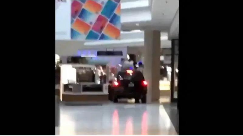 Video posted on social media shows the black Chevy Trailblazer driving through the Woodfield Mall in Schaumburg. (Photo: Screengrab) Video posted on social media shows the black Chevy Trailblazer driving through the Woodfield Mall in Schaumburg. (Photo: Screengrab)
