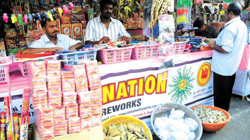 Though the number of stalls in Chalai market has come down drastically following the stringent conditions laid down for license post Puttingal temple tragedy, it has not dampened the spirits of people. (Photo: DC) Though the number of stalls in Chalai market has come down drastically following the stringent conditions laid down for license post Puttingal temple tragedy, it has not dampened the spirits of people. (Photo: DC)