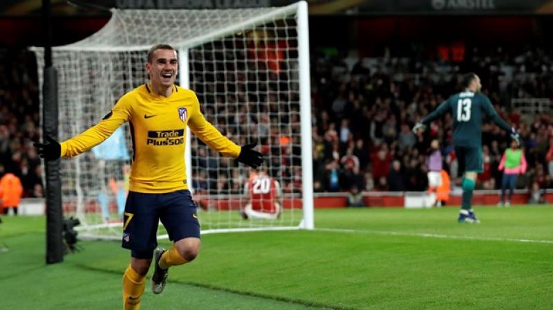 Griezmann went past goalkeeper David Ospina to flick the ball in past defender Shkodran Mustafi, who slipped. (Photo: AP) Griezmann went past goalkeeper David Ospina to flick the ball in past defender Shkodran Mustafi, who slipped. (Photo: AP)