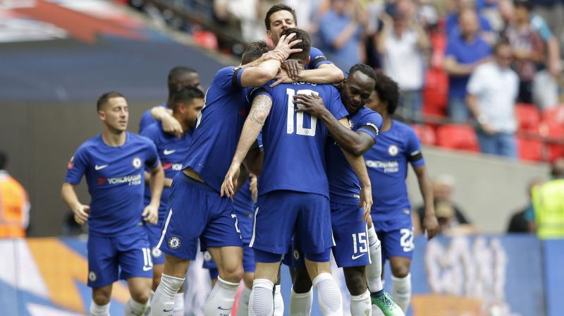 Chelsea travel to the Liberty Stadium boosted by clinching a place in the FA Cup final against Manchester United after beating Southampton last weekend. (Photo: AP) Chelsea travel to the Liberty Stadium boosted by clinching a place in the FA Cup final against Manchester United after beating Southampton last weekend. (Photo: AP)