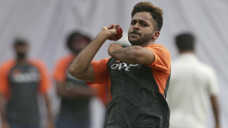 The pacer, who was handed over the Test cap by coach Ravi Shastri this morning, bowled just 1.4 overs before leaving the ground due to pain in the groin region. (Photo: AP) The pacer, who was handed over the Test cap by coach Ravi Shastri this morning, bowled just 1.4 overs before leaving the ground due to pain in the groin region. (Photo: AP)