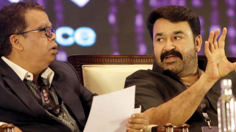 Actor Mohanlal with DGP Lokanath Behera during the valedictory session of two-day global cyber security and hacking conference in Kochi on Saturday.(Photo: ARUN CHANDRABOSE) Actor Mohanlal with DGP Lokanath Behera during the valedictory session of two-day global cyber security and hacking conference in Kochi on Saturday.(Photo: ARUN CHANDRABOSE)