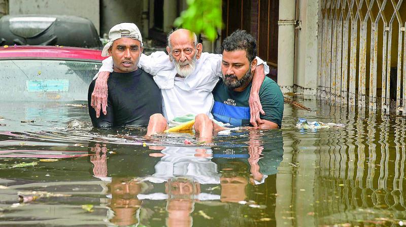 An elderly person being rescued from a flood-affected colony at Rajendra Nagar in Patna on Monday. (Photo: PTI) An elderly person being rescued from a flood-affected colony at Rajendra Nagar in Patna on Monday. (Photo: PTI)