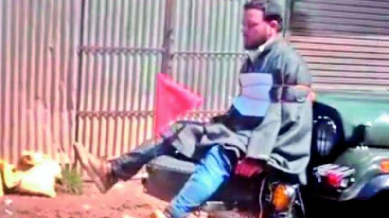 File photo of Farooq Ahmed Dar, the Kashmiri shawl weaver tied to the armed forces. File photo of Farooq Ahmed Dar, the Kashmiri shawl weaver tied to the armed forces.