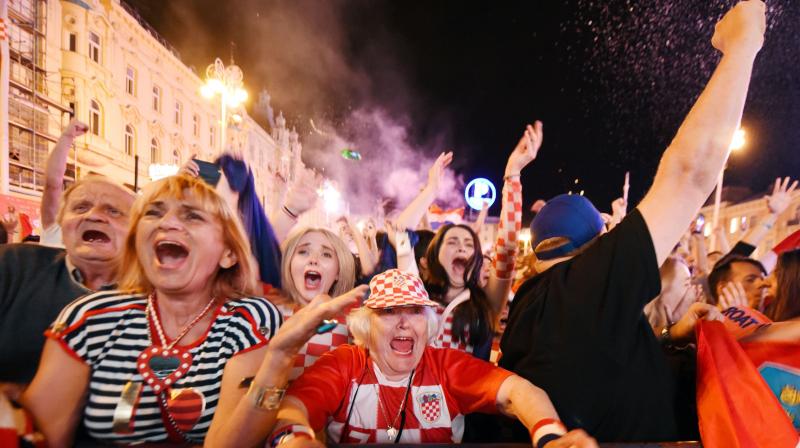 There were shouts of joy, hundreds of flares were lit and Croatian flags were waved as an estimated 15,000 fans celebrated the win for captain Luka Modric's side win in Zagreb's main square, where they had watched the match on a giant screen. (Photo: AFP) There were shouts of joy, hundreds of flares were lit and Croatian flags were waved as an estimated 15,000 fans celebrated the win for captain Luka Modric's side win in Zagreb's main square, where they had watched the match on a giant screen. (Photo: AFP)