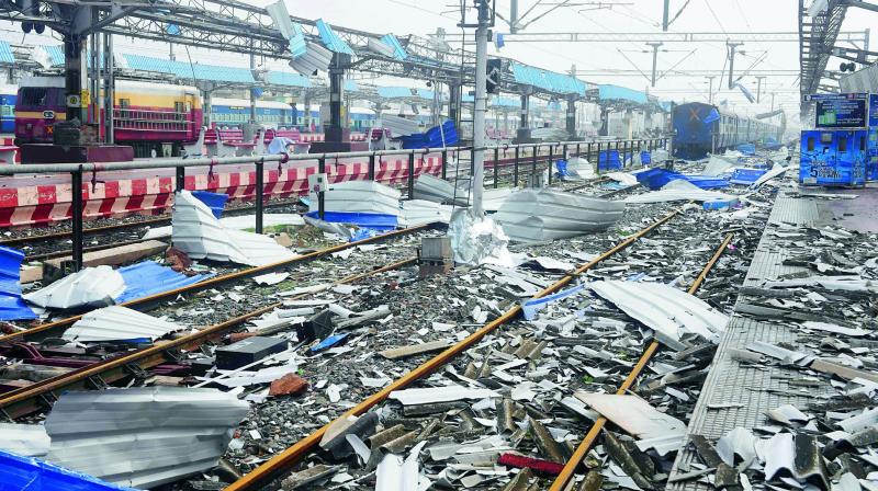 Debris litters the train tracks at the damaged railway station in Puri on Saturday. (AFP) Debris litters the train tracks at the damaged railway station in Puri on Saturday. (AFP)