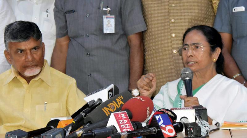 West Bengal Chief Minister Mamata Banerjee, with Andhra Pradesh CM N Chandrababu Naidu address media in New Delhi on Saturday. (Photo: PTI) West Bengal Chief Minister Mamata Banerjee, with Andhra Pradesh CM N Chandrababu Naidu address media in New Delhi on Saturday. (Photo: PTI)