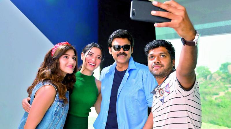 Mehreen Kaur, Tamannaah, Venkatesh and Anil Ravipudi on the sets of F2. Mehreen Kaur, Tamannaah, Venkatesh and Anil Ravipudi on the sets of F2.