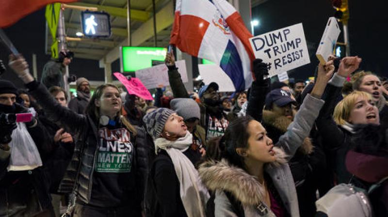 Protesters block an intersection near Terminal 4 at John F. Kennedy International Airport in New York, Saturday, Jan. 28, 2017, after earlier in the day two Iraqi refugees were detained while trying to enter the country. (Photo: AP) Protesters block an intersection near Terminal 4 at John F. Kennedy International Airport in New York, Saturday, Jan. 28, 2017, after earlier in the day two Iraqi refugees were detained while trying to enter the country. (Photo: AP)