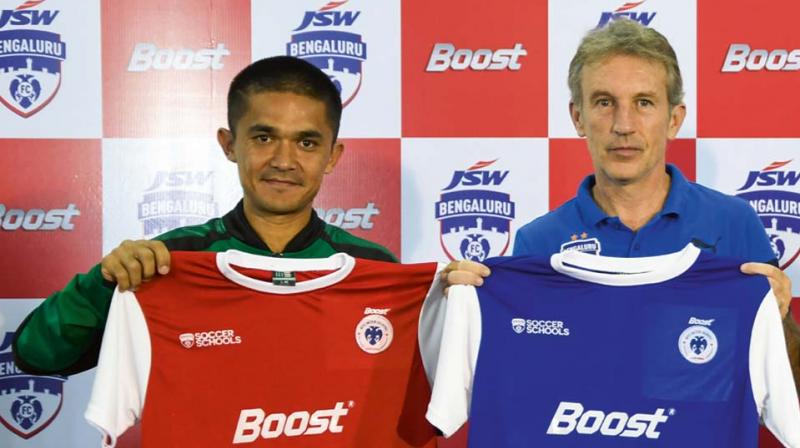 Bengaluru FC skipper Sunil Chhetri (left) and head coach Albert Roca at an event in Bengaluru on Tuesday. Bengaluru FC skipper Sunil Chhetri (left) and head coach Albert Roca at an event in Bengaluru on Tuesday.