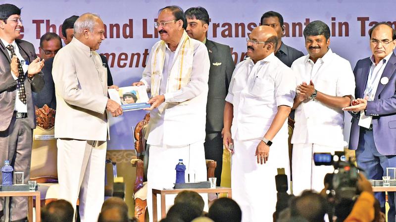 Vice President M. Venkaiah Naidu releases a book during the felicitation programme to mark the successful completion of 1,000 liver transplants in Tamil Nadu by Dr Mohamed Rela on Tuesday. (Photo: DC) Vice President M. Venkaiah Naidu releases a book during the felicitation programme to mark the successful completion of 1,000 liver transplants in Tamil Nadu by Dr Mohamed Rela on Tuesday. (Photo: DC)
