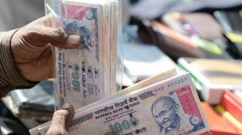Finance Minister Arun Jaitley on Thursday said the demonetisation of Rs 500/1,000 notes led to formalisation of economy, more tax collection and higher growth. (Photo: AFP) Finance Minister Arun Jaitley on Thursday said the demonetisation of Rs 500/1,000 notes led to formalisation of economy, more tax collection and higher growth. (Photo: AFP)