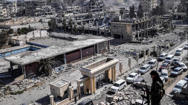 "Fourteen civilians, including five children under the age of 18, were killed in the coalition air raids on the villages of Hajin, Sousa and Al-Shaafa" in eastern Deir Ezzor province, the Syrian Observatory for Human Rights said. (Representational image | AP) "Fourteen civilians, including five children under the age of 18, were killed in the coalition air raids on the villages of Hajin, Sousa and Al-Shaafa" in eastern Deir Ezzor province, the Syrian Observatory for Human Rights said. (Representational image | AP)