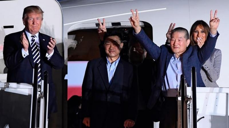 Donald Trump applauds as US detainees Tony Kim, Kim Hak-song and Kim Dong-chul arrive on US soil. (Photo: AFP) Donald Trump applauds as US detainees Tony Kim, Kim Hak-song and Kim Dong-chul arrive on US soil. (Photo: AFP)